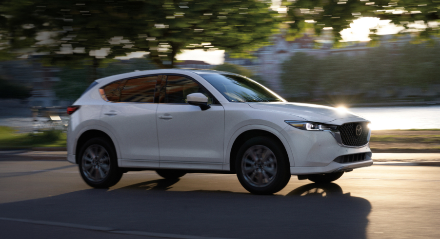 White 2025 Mazda CX-5 Driving