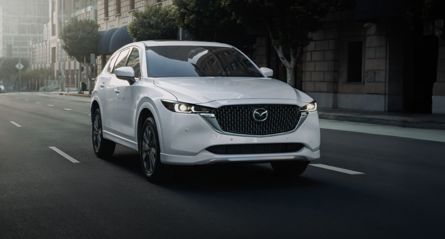 White 2025 Mazda CX-5 on the road