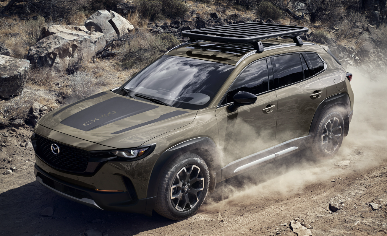 Brown 2026 Mazda CX-50 driving off-road