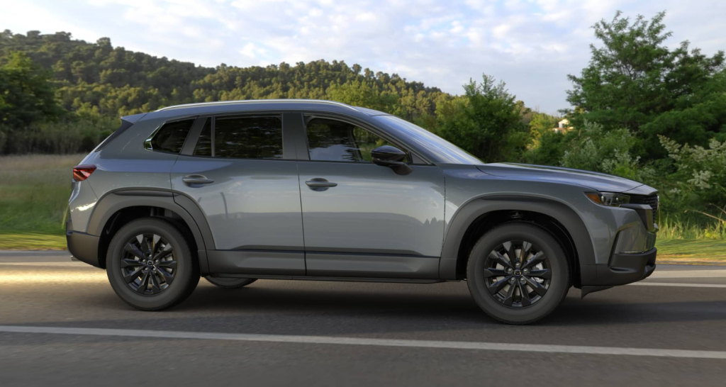 Gray 2026 Mazda CX-50 driving on road