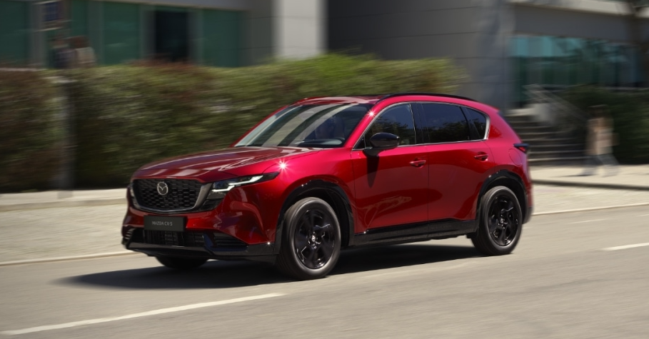 Red 2026 Mazda CX-5 driving on road